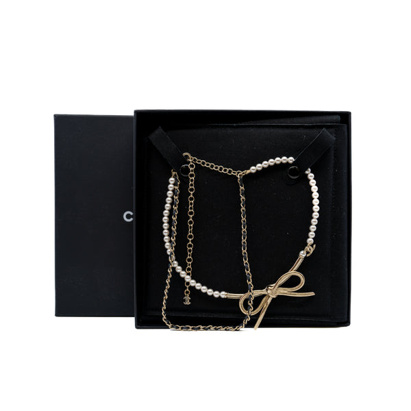 Calfskin Pearl Metal CC Bow Necklace Gold White Black - L'UXE LINK