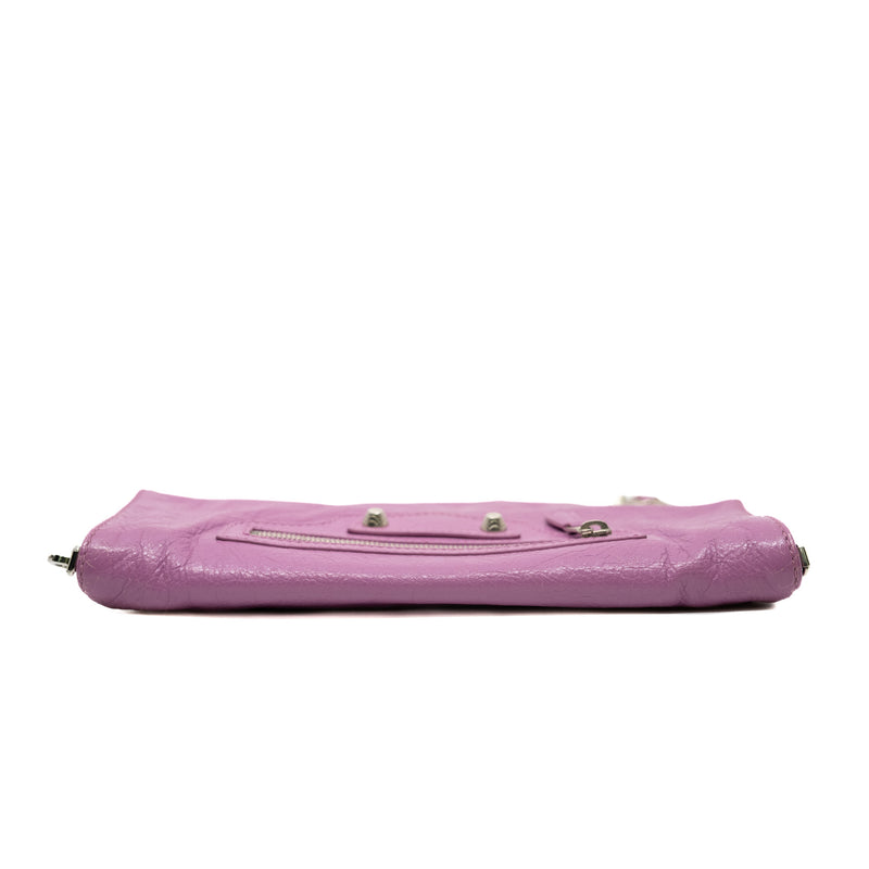 leather clutch bag in pink purple