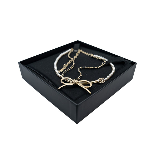 Calfskin Pearl Metal CC Bow Necklace Gold White Black - L'UXE LINK