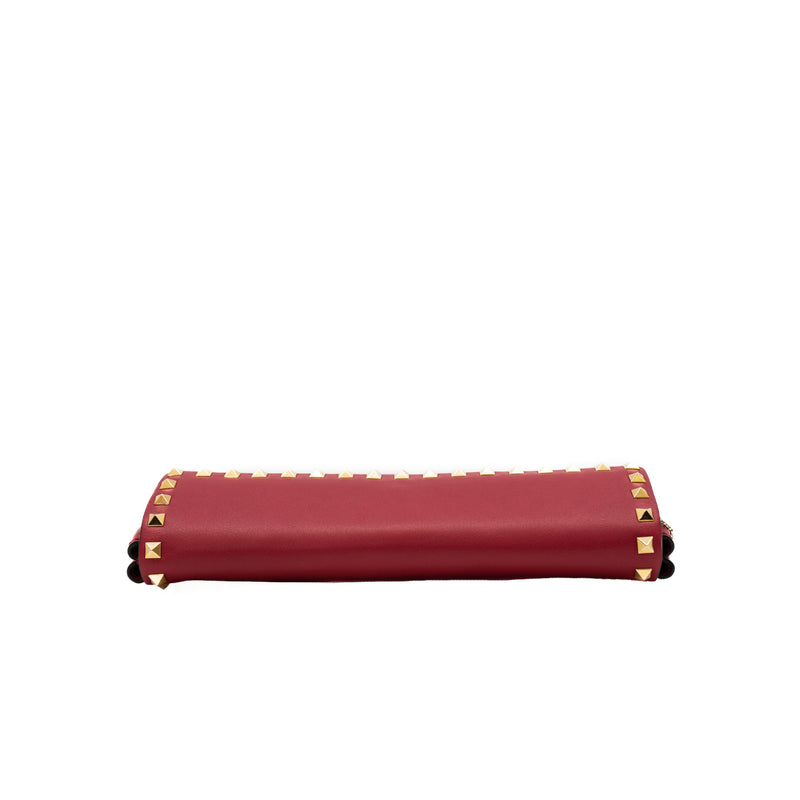 long clutch with stads bangle handle in leather rosepink ghw